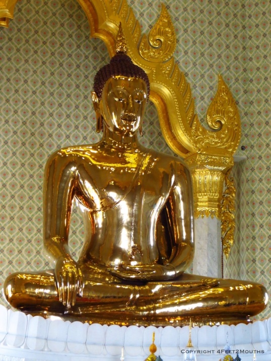 Solid gold Buddha